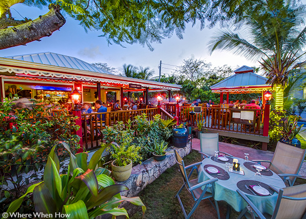 A photograph of Caicos Café on Governors Road, Providenciales (Provo), Turks and Caicos Islands.