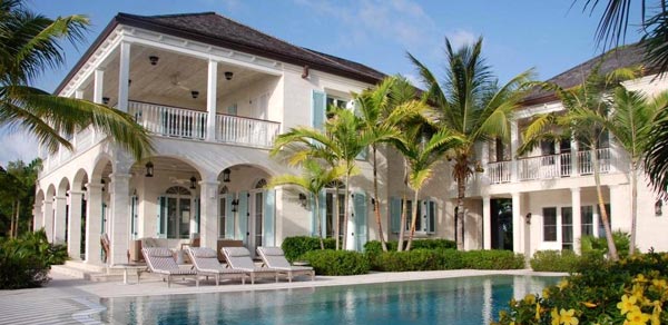 A photograph of Amazing Grace, a 12,000 sq ft private colonial style villa on Grace Bay, Turks and Caicos, designed by SWA Architects.