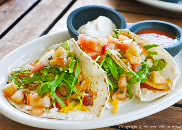 A photograph of Fish Tacos at Somewhere on the Beach Café, Coral Gardens Resort, Grace Bay Beach, Providenciales (Provo), Turks and Caicos Islands.